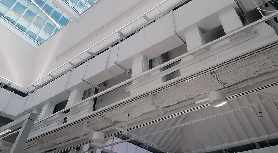 Soft dB SMS-STR sound masking speaker suspended in the plenum above a suspended ceiling