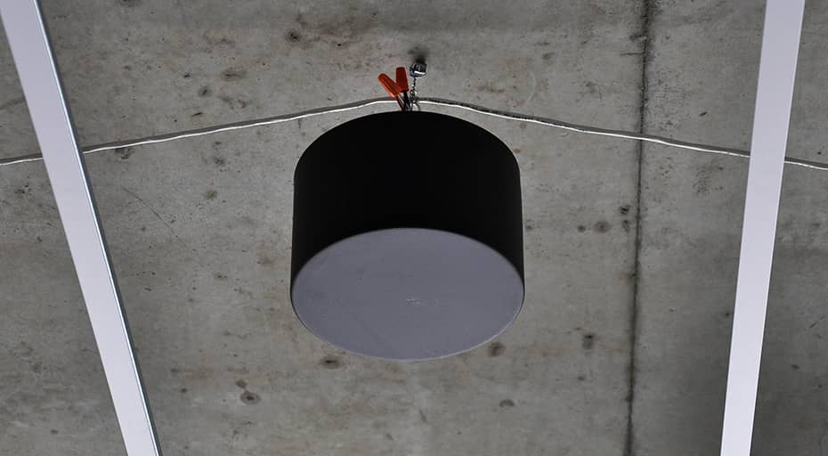 Soft dB sound masking speakers installed in an open ceiling office space